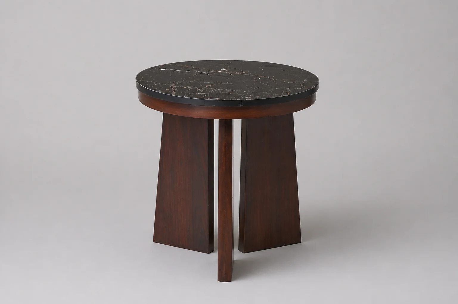 Round dark-top side table